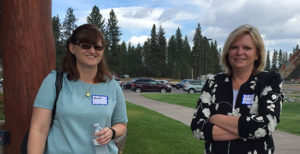 Heidi Rohrlach, Controller, and Rita Matthews, Sr. VP of Administration, take a breather from all the feel good events.